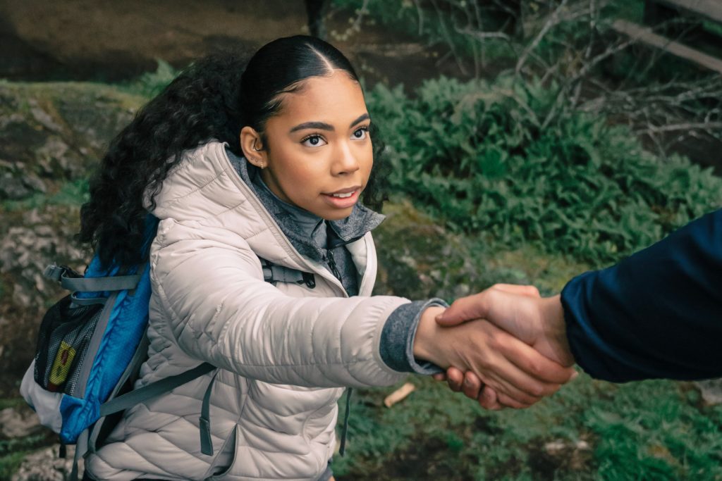 Young Woman Holding Someone's Hand